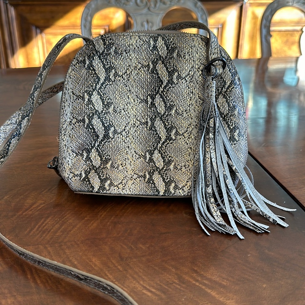 Pristine Hobo crossbody handbag with sassy gold snake print leather.